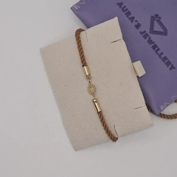 18 Carat Gold Sun Charm Bracelet