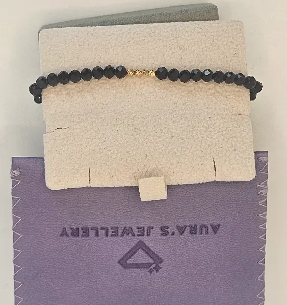 18 Carat Gold Beaded Charm Bracelet