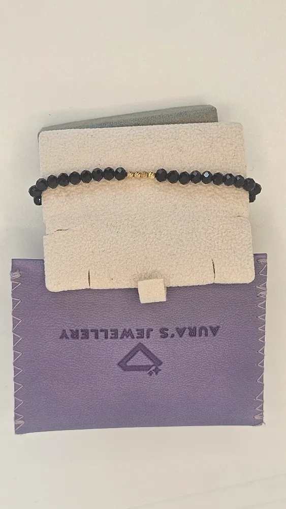 18 Carat Gold Beaded Charm Bracelet