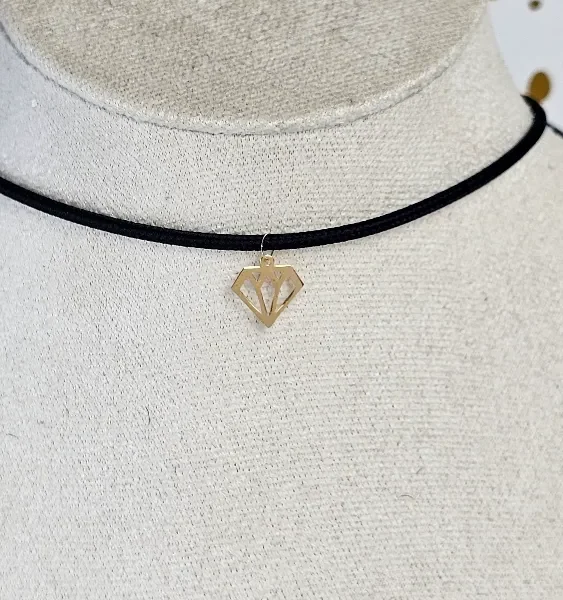 18 Carat Gold Diamond Charm Necklace on Black Choker