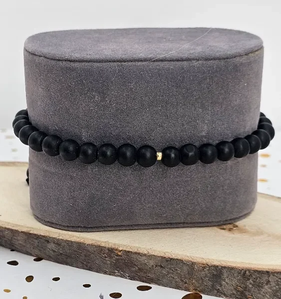 Men’s Black Beaded Bracelet with 18 Carat Gold Accent