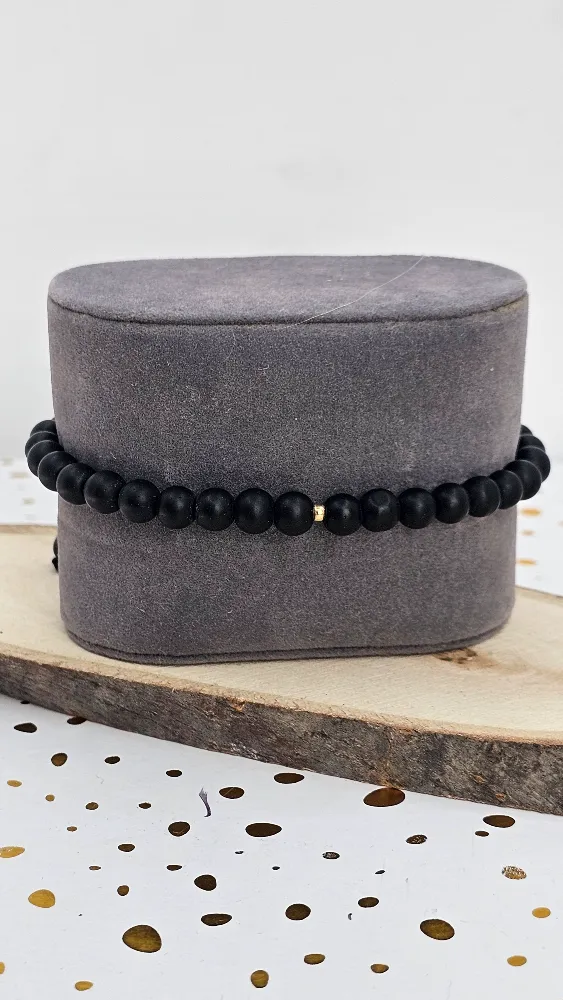 Men’s Black Beaded Bracelet with 18 Carat Gold Accent