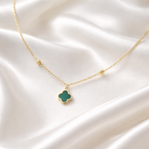 Elaria 18K gold clover necklace with green stone pendant on delicate chain