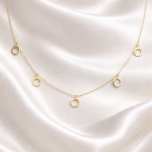 Oria 18K gold circle charm necklace with multiple minimal round pendants