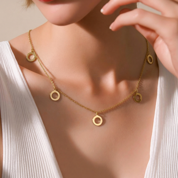Oria 18K gold circle charm necklace with multiple minimal round pendants