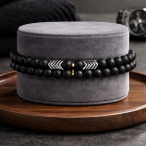 Orion Beads men’s bracelet with matte black beads and gold arrow accents