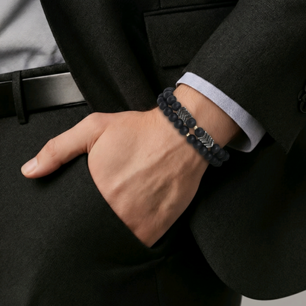 Orion Beads men’s bracelet with matte black beads and gold arrow accents