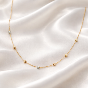 Serelle 18K gold beaded necklace with delicate multi-tone bead accents