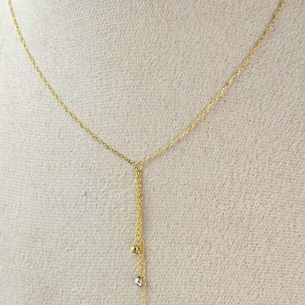 Velora 18K gold drop necklace with delicate tassel chain and bead accents