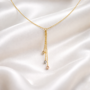 Velora 18K gold drop necklace with delicate tassel chain and bead accents